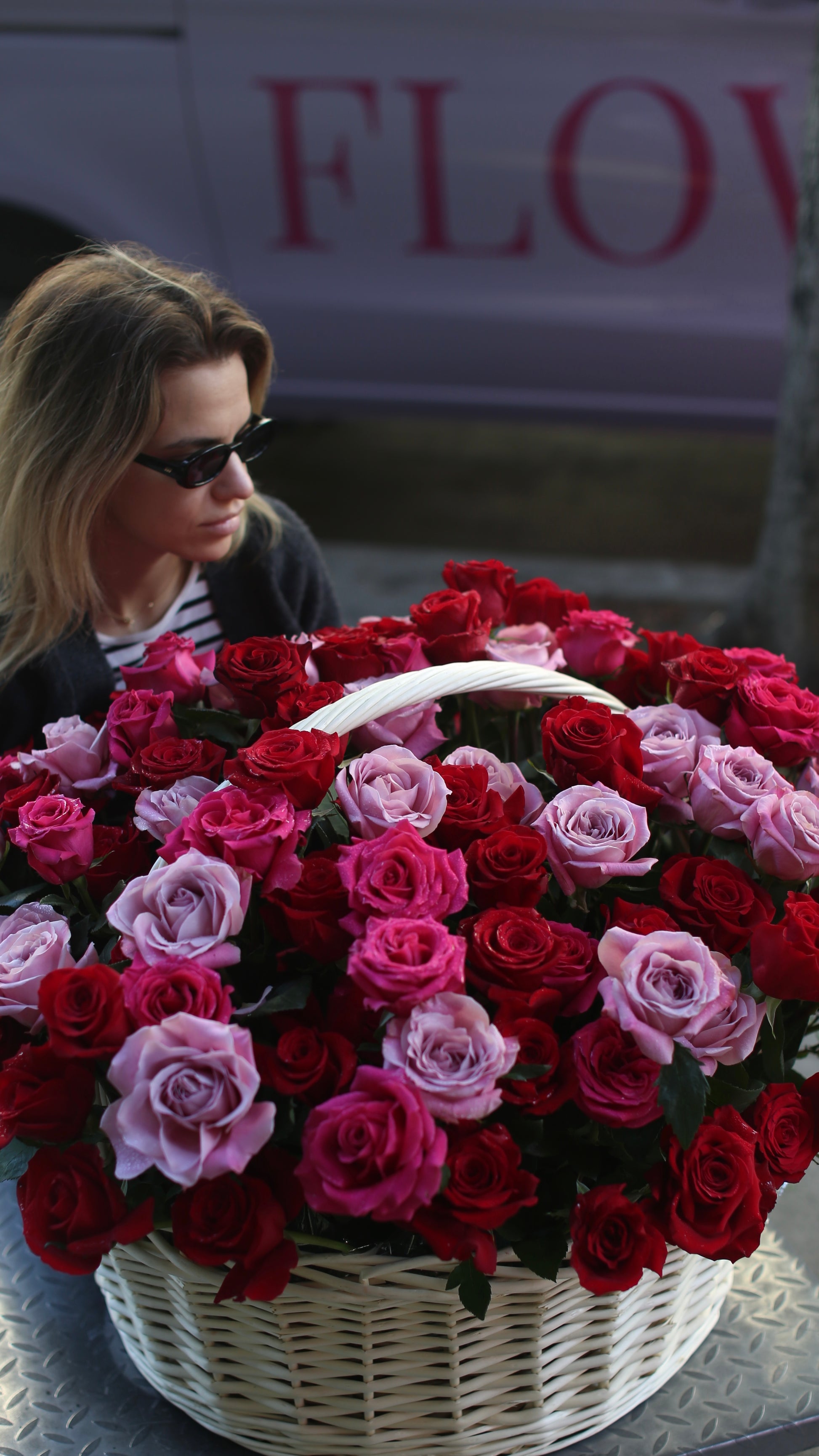 Luxurious floral arrangement featuring pink peonies and garden greens, ideal for expressing heartfelt emotions.