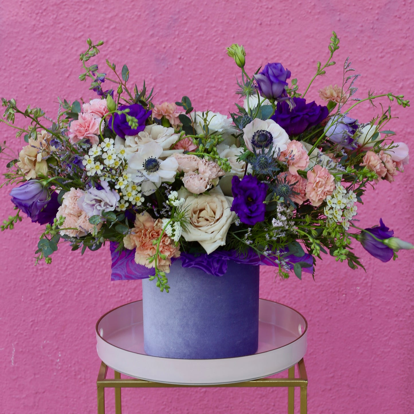 Elegant bouquet of white anemones with soft green accents, ideal for serene celebrations