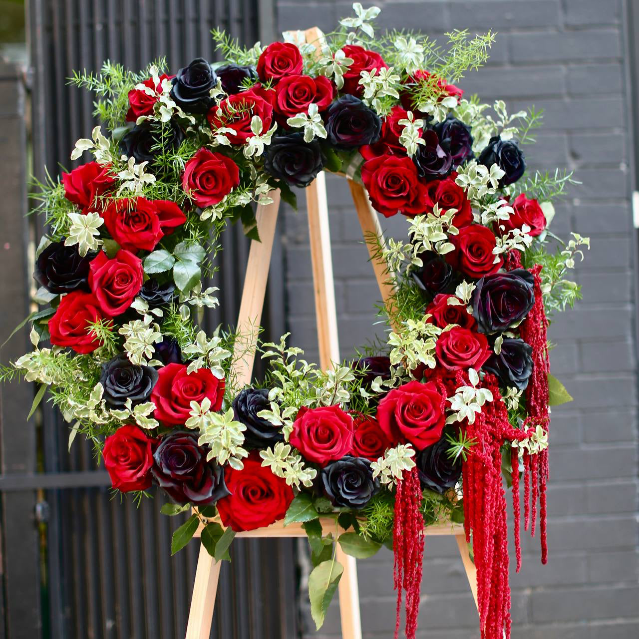 Elegant floral arrangement of white blooms, symbolizing peace and remembrance