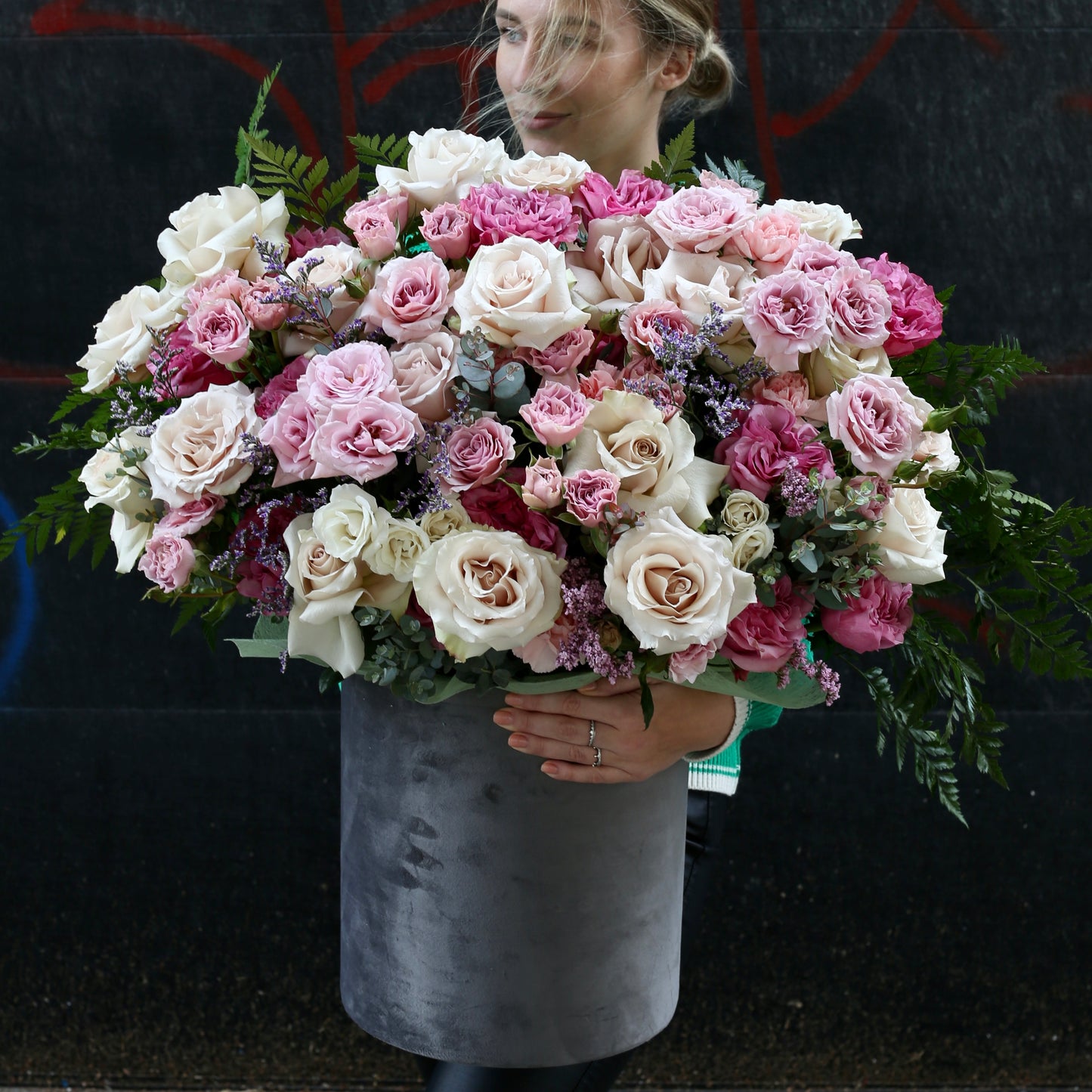 Pastel pink and white rose bouquet with lush greenery, wrapped in ivory satin ribbon — Rosy Garden by Pink Clover LA.