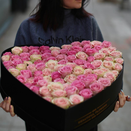 Luxurious bouquet of red roses symbolizing romance and devotion, elegantly wrapped for gifting