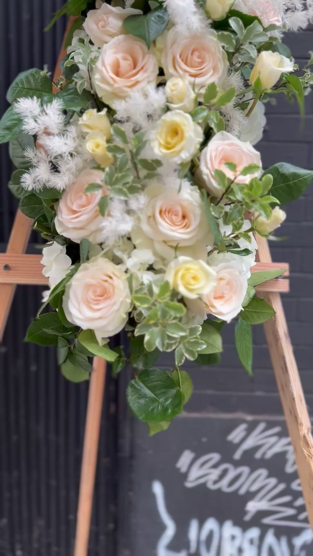 Handcrafted sympathy bouquet with serene white lilies, ideal for honoring cherished memories