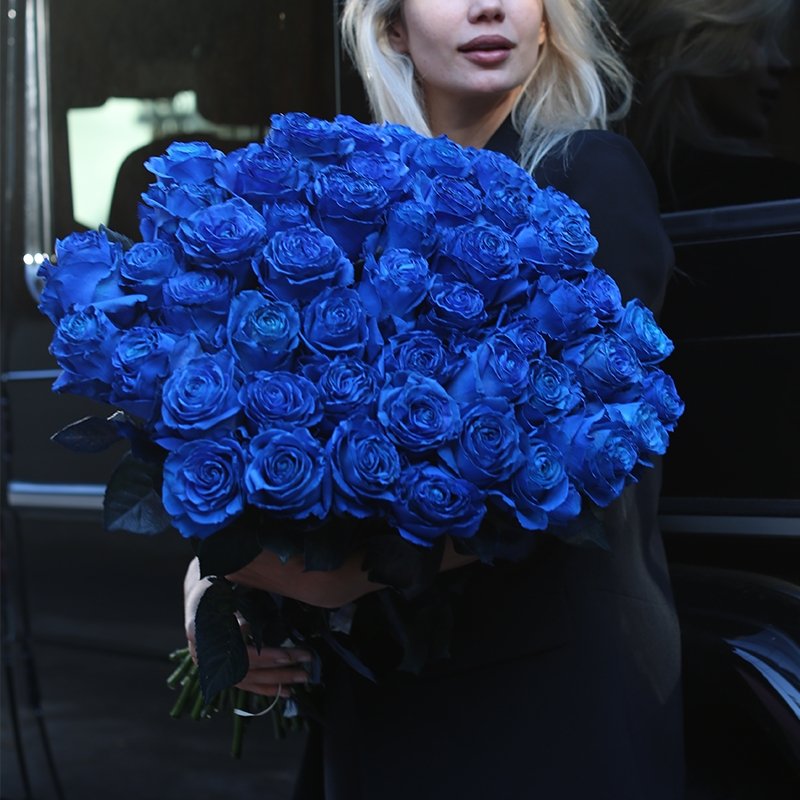 Handcrafted Blue Roses bouquet with richly colored petals and delicate textures, presented for a refined and memorable look