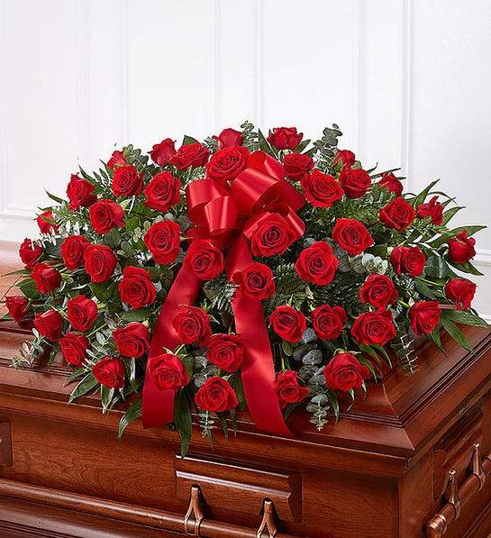 Casket Cover Memory styled in setting - luxury funeral spray Los Angeles florist