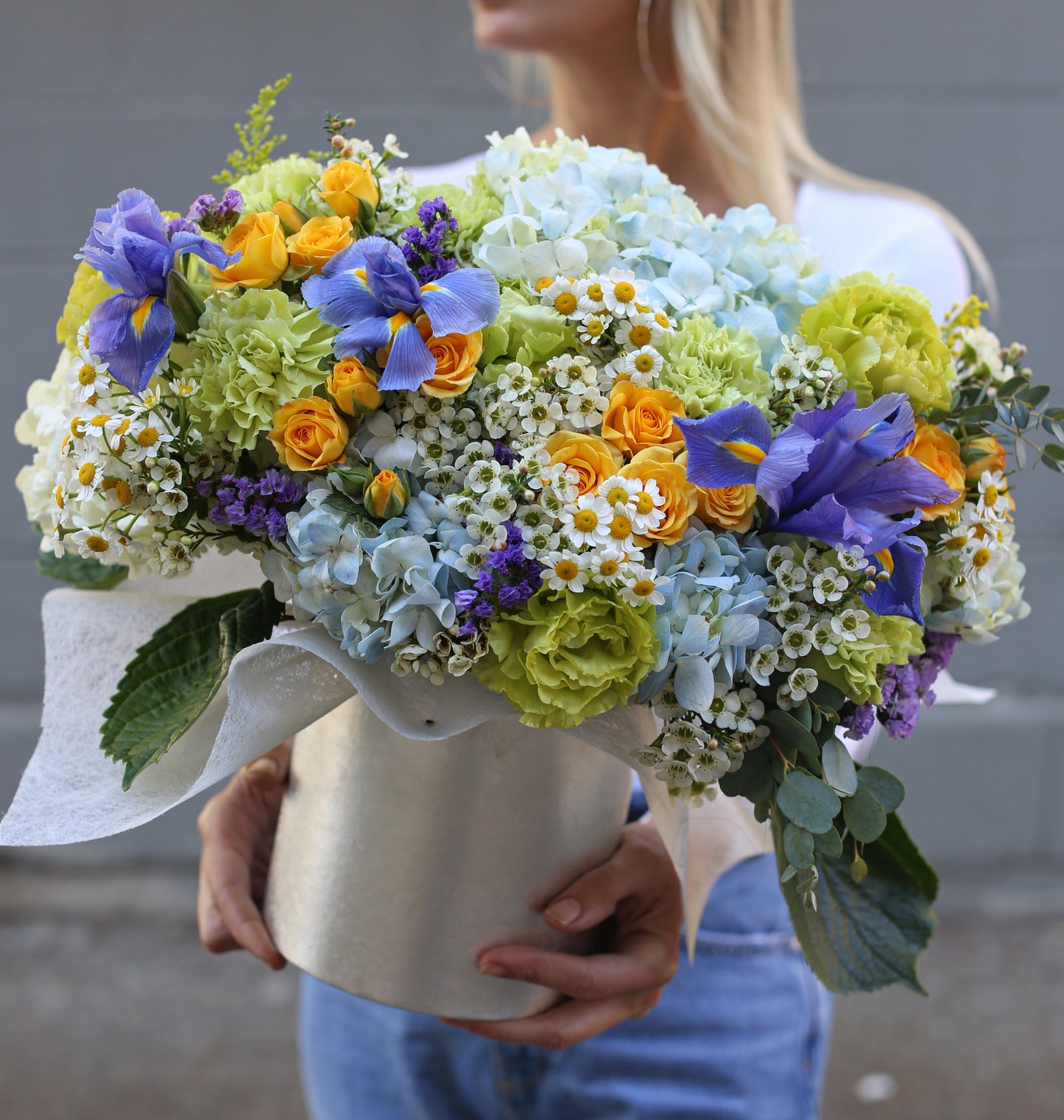 Elegant spring-inspired bouquet styled in a premium gift-ready box, showcasing fresh blooms and artistic floral design