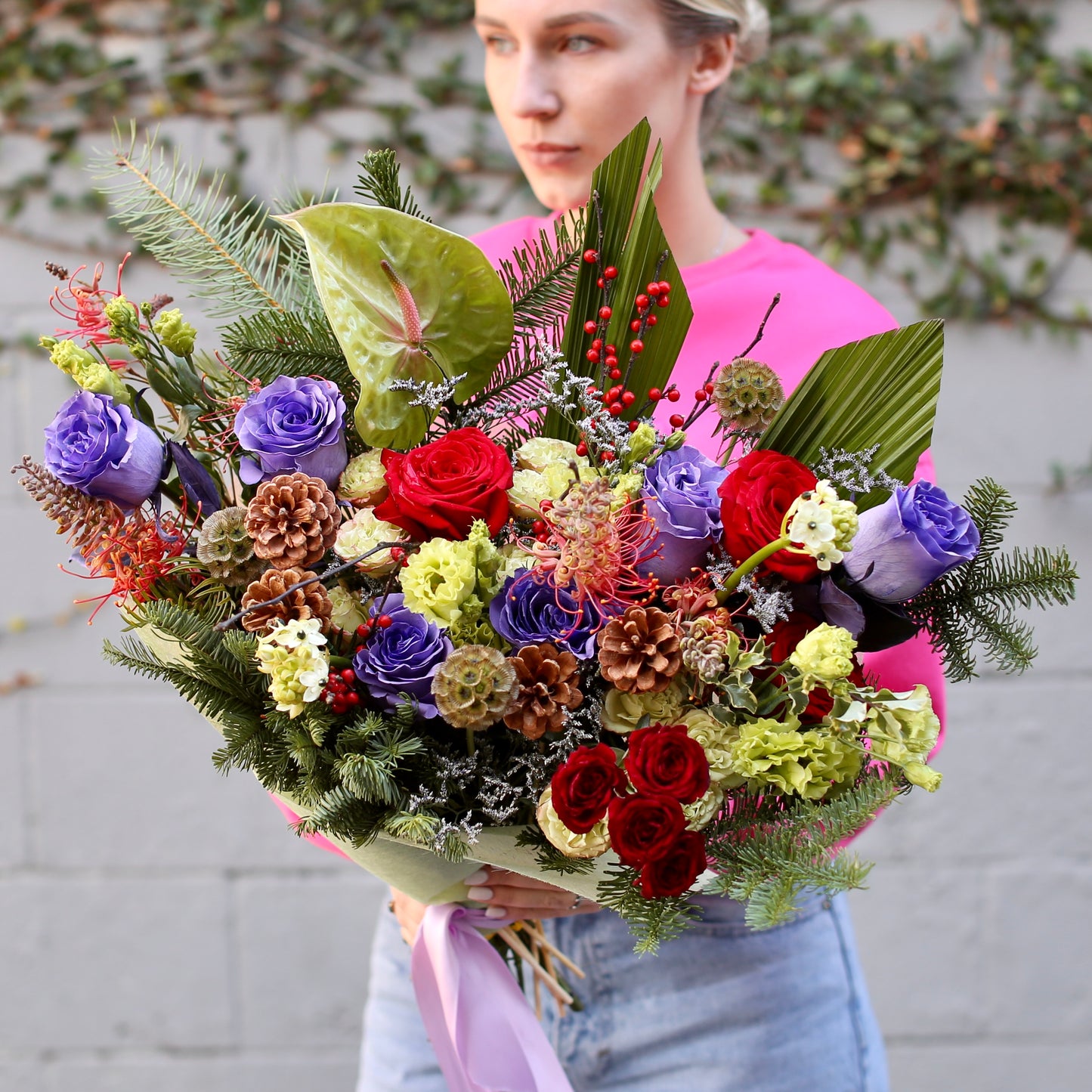 Festive Christmas floral arrangement showcasing fresh blooms and seasonal accents in a celebratory design