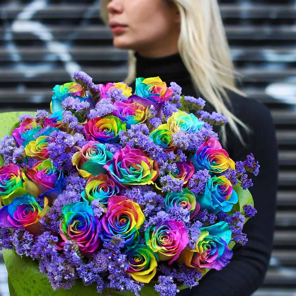 Vibrant Rainbow Dash bouquet featuring rainbow roses and mixed flowers, beautifully arranged for luxury gifting