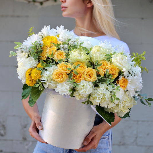 Elegant Zara bouquet featuring yellow roses and white mixed flowers beautifully arranged in a decorative keepsake box – ideal for luxury gifting