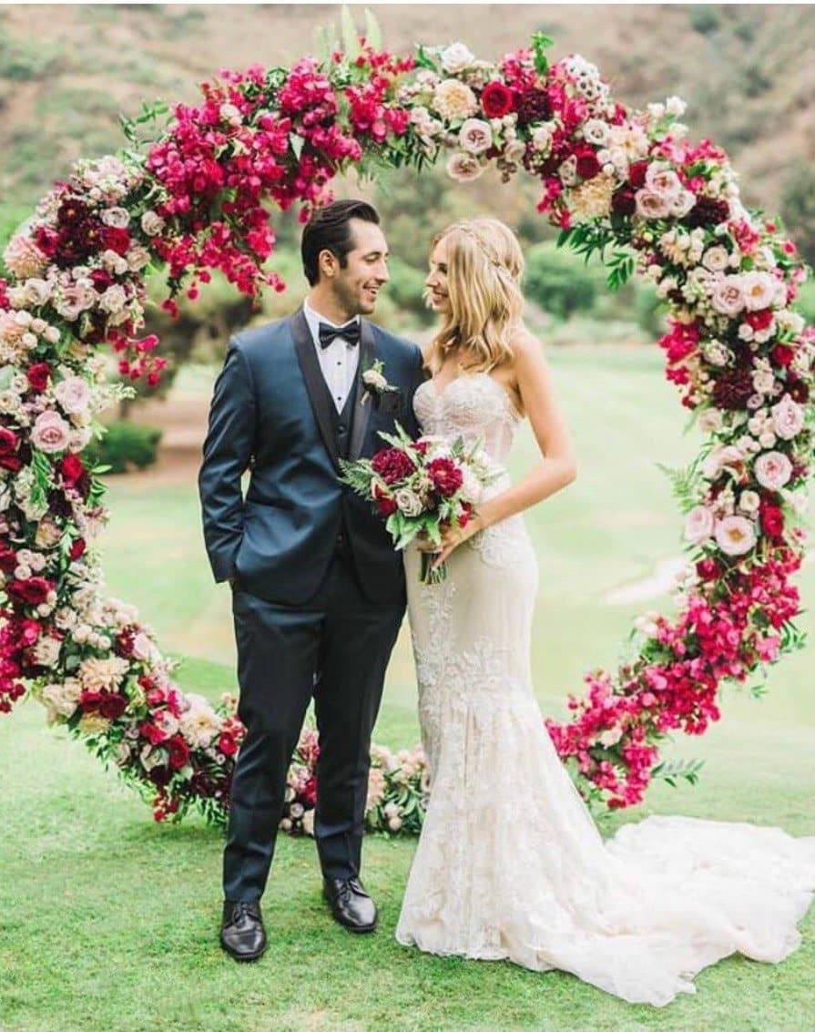 
                  
                    Wedding arch (round shape with roses, greenery, wild flowers)
                  
                