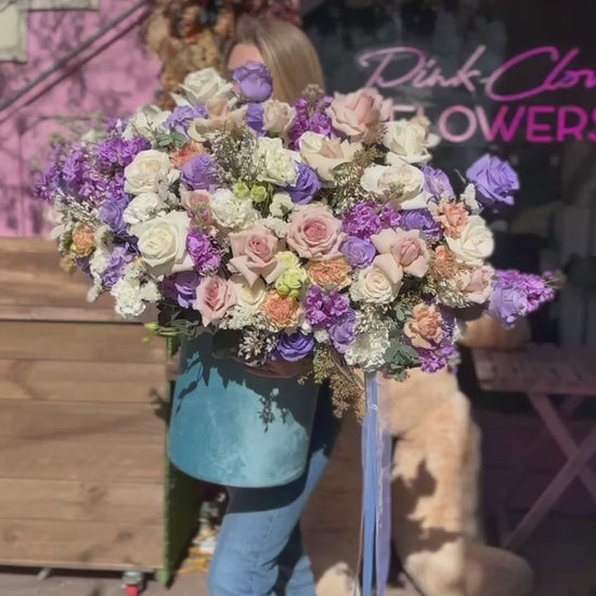 Thoughtful floral gift with fresh blooms arranged in a calming palette, ideal for comfort and sympathy occasions