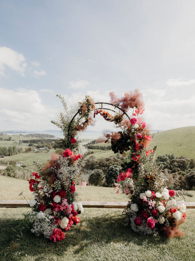 
                  
                    Wedding arch with flowers
                  
                