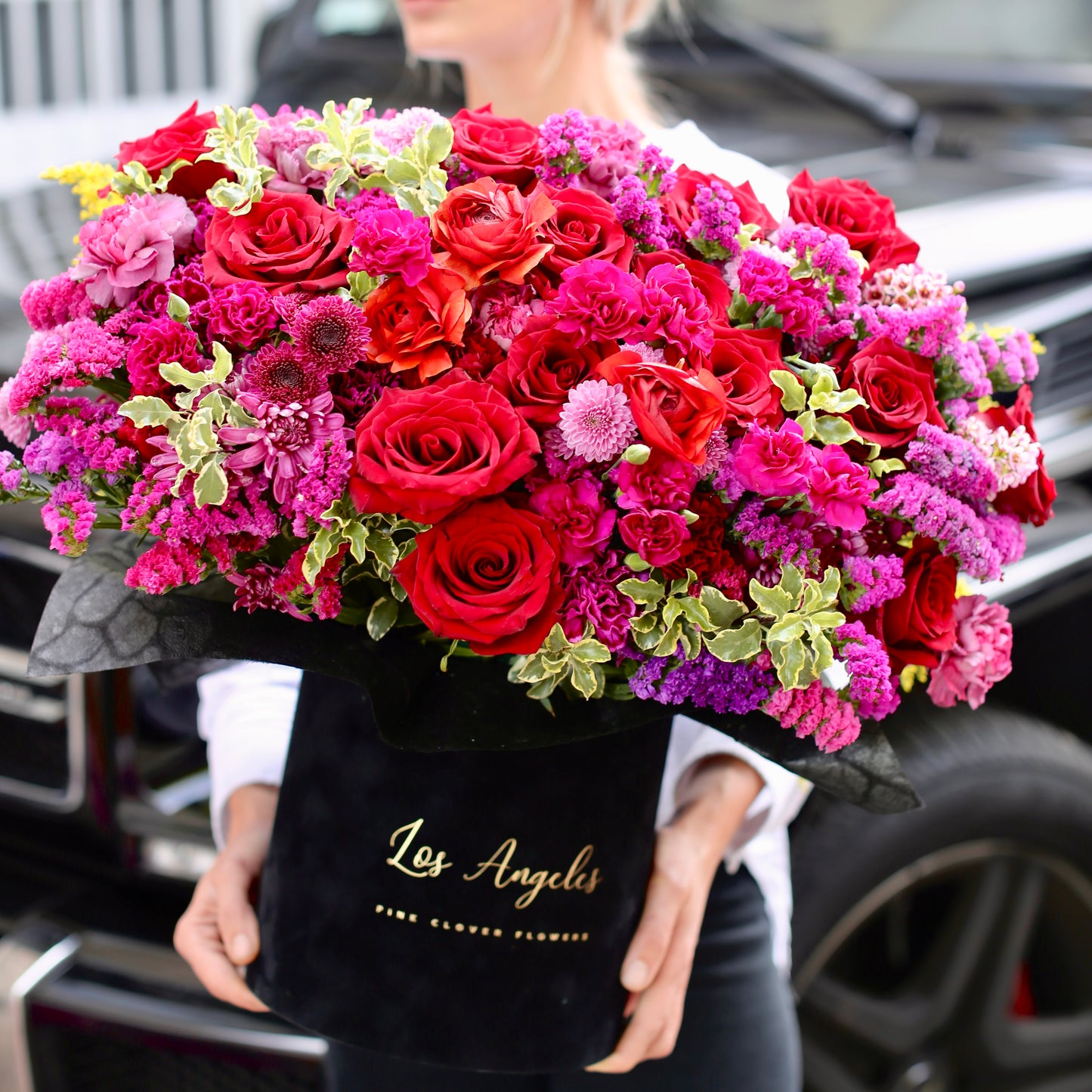 
                  
                    Luxury (red roses with mix flowers)
                  
                