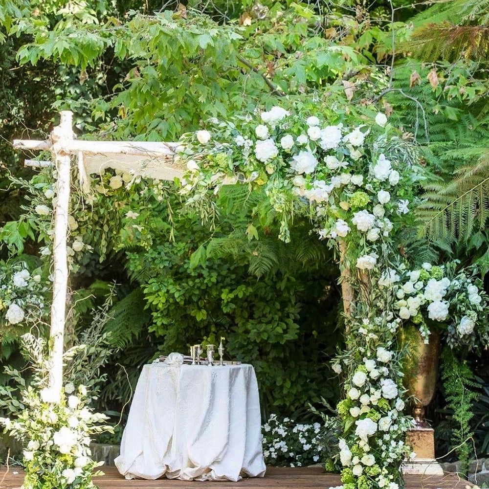 
                  
                    Wedding arch with flowers
                  
                