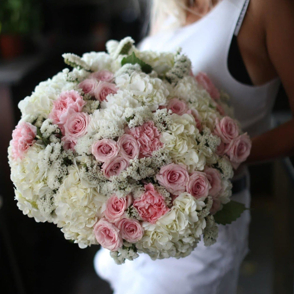 
                      
                        White hydrangea with pink roses bouquet Roxanne - Los Angeles Florist - Pink Clover
                      
                    