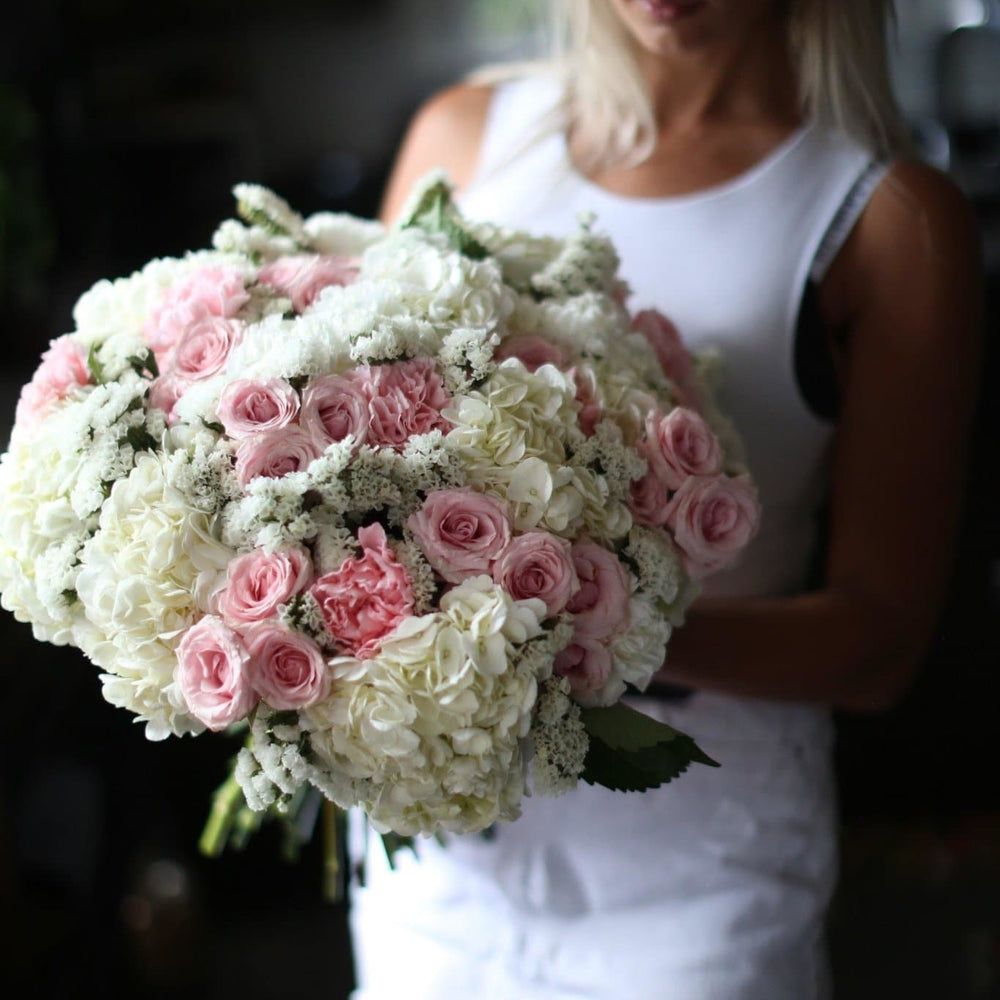 
                      
                        White hydrangea with pink roses bouquet Roxanne - Los Angeles Florist - Pink Clover
                      
                    